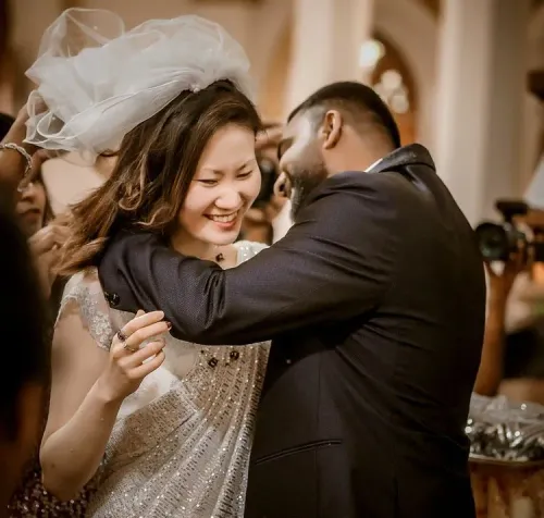 Bride and groom sharing their first dance at the wedding reception